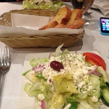 Ithaca Greek Mediterranean Restaurant - Greek salad and garlic bread. - Mediterranean Near Me - Markham, Ontario Ithaca Greek Mediterranean Restaurant - Greek salad and garlic bread. - Mediterranean Near Me - Markham, Ontario