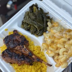 Southrn Spice - Lamb chop entree on a bed of jasmine rice with mac and cheese and collard greens.