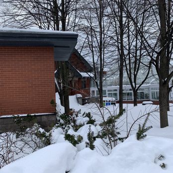 Conservatoire Et Serres Patrimoniales - Side view of the Westmount Library, with the attached greenhouse to the right. - Nurseries & Gardening Near Me - Westmount, Quebec Conservatoire Et Serres Patrimoniales - Side view of the Westmount Library, with the attached greenhouse to the right. - Nurseries & Gardening Near Me - Westmount, Quebec