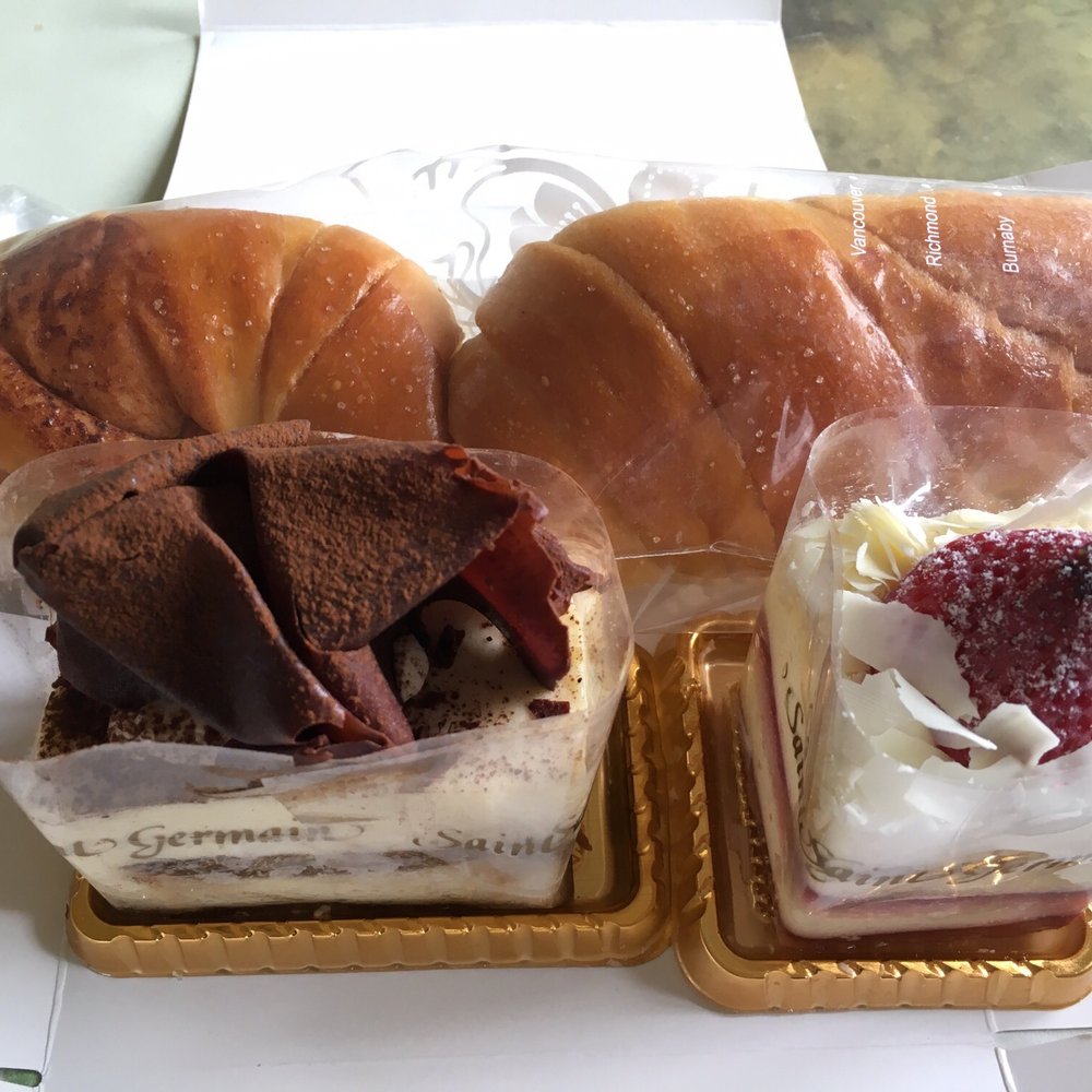 Saint Germain Bakery - Tiramisu($3.50) on bottom left, White Choco Strawberry cake($3.99) on bottom right and Cinnamon Stick ($1.35) - Bakeries Near Me - Burnaby, British Columbia Saint Germain Bakery - Tiramisu($3.50) on bottom left, White Choco Strawberry cake($3.99) on bottom right and Cinnamon Stick ($1.35) - Bakeries Near Me - Burnaby, British Columbia