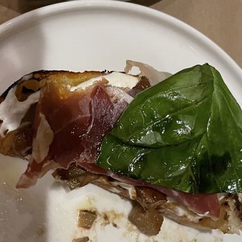 GRATA Italian Eatery - Bruschetta with pear, prosciutto, and basil - we meant to take a picture of the full dish but dug in too soon.... oops! - Italian Near Me - Windsor, California