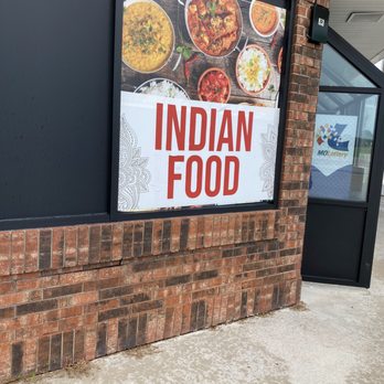 Indian Food - a sign on the side of a building - Indian Near Me - Strafford, Missouri Indian Food - a sign on the side of a building - Indian Near Me - Strafford, Missouri