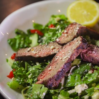 Carnivore - House Salad, Herbivore with Flame-Grilled Sirloin Strips - Steakhouses Near Me - St. Louis, Missouri Carnivore - House Salad, Herbivore with Flame-Grilled Sirloin Strips - Steakhouses Near Me - St. Louis, Missouri