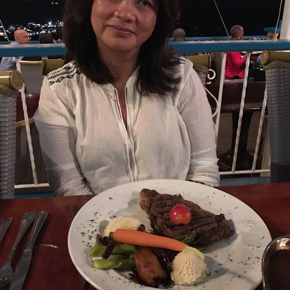 Mafolie Hotel & Restaurant - Mom with her filet - Hotels Near Me - St. Thomas, Virgin Islands Mafolie Hotel & Restaurant - Mom with her filet - Hotels Near Me - St. Thomas, Virgin Islands
