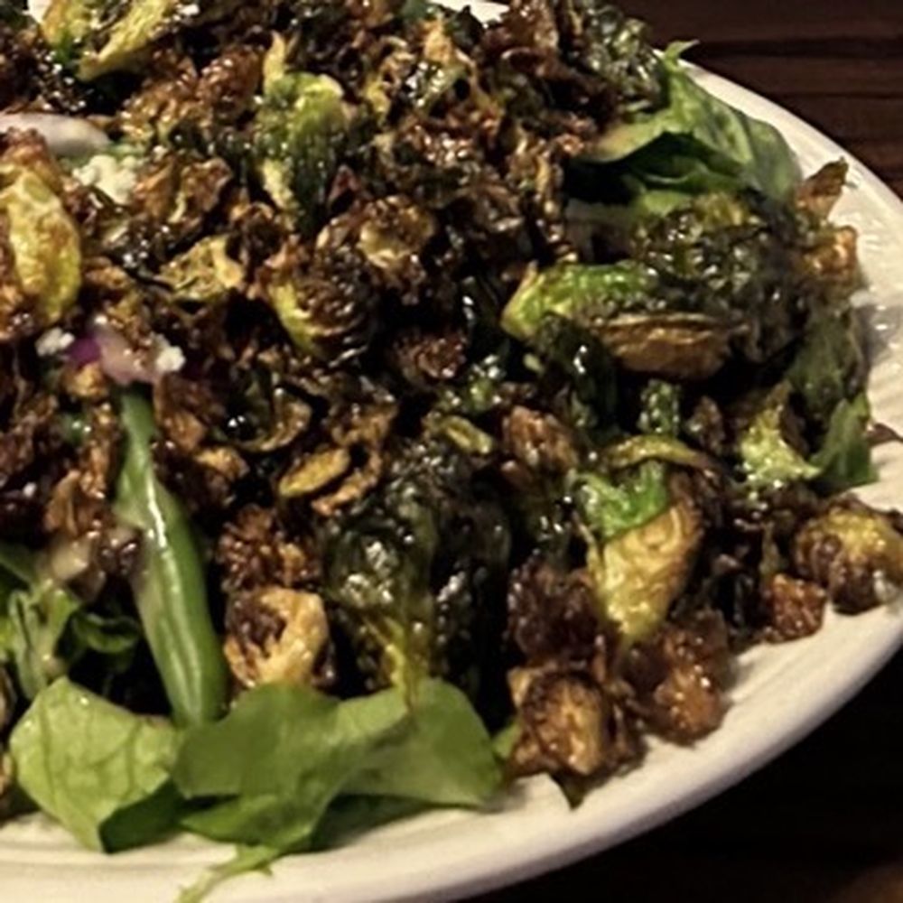 Brussels sprout salad with salmon medium rare