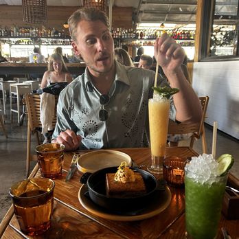 Campfire - Upper East Side (mocktail) Colada (yellow drink) - New American Near Me - Carlsbad, California Campfire - Upper East Side (mocktail) Colada (yellow drink) - New American Near Me - Carlsbad, California