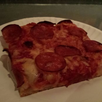 More Home Slice Pizza - Sicilian style (thick square) pizza slice with pepperoni - very delicious.  They offer the Sicilian style pizza on Mondays. - Pizza Near Me - Austin, Texas
