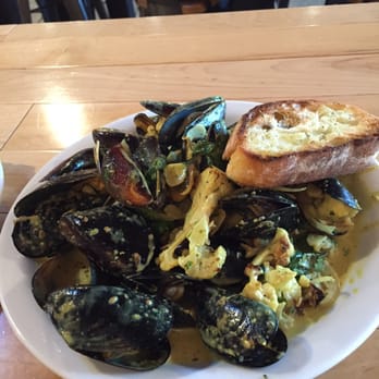 Industrial Eats - Mussels with Curry, Cauliflower & Lime - get extra bread for this sauce!!! - Pizza Near Me - Buellton, California Industrial Eats - Mussels with Curry, Cauliflower & Lime - get extra bread for this sauce!!! - Pizza Near Me - Buellton, California