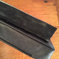 Stacy's Hot Rod Upholstery - Raw foam spray glued to the cushion and rattle-canned black.