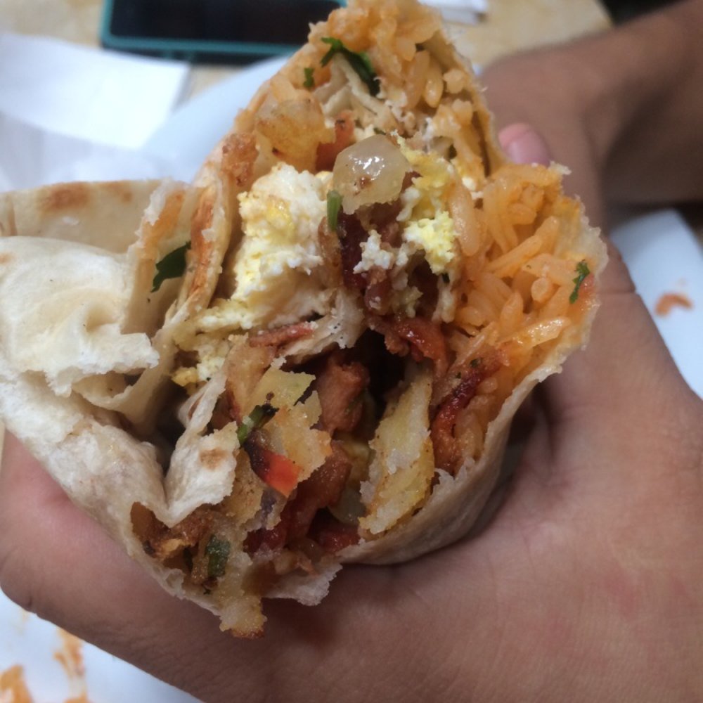 Jaliscos - Burrito Tonaya- egg, bacon, rice, beans, potato, cheese, onion, and cilantro minus the salsa. Bacon nice and crunchy!! - Mexican Near Me - Port Hueneme, California Jaliscos - Burrito Tonaya- egg, bacon, rice, beans, potato, cheese, onion, and cilantro minus the salsa. Bacon nice and crunchy!! - Mexican Near Me - Port Hueneme, California