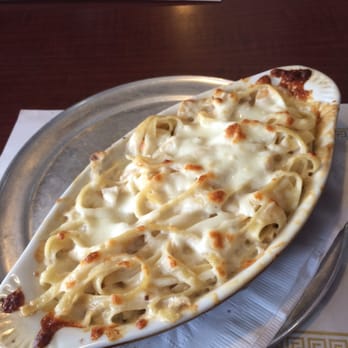 Pizza Stop - a plate of food on a table - Pizza Near Me - Kansas City, Kansas Pizza Stop - a plate of food on a table - Pizza Near Me - Kansas City, Kansas