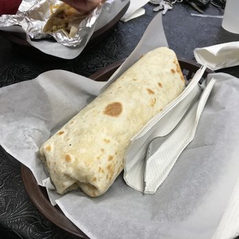 Pflugerville Taco House - Bacon, Egg, Cheese, Potato and Beans...Thing is a monster and well worth the price!! - Mexican Near Me - Pflugerville, Texas
