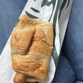 Starbucks - Ham and Swiss croissant with a bite taken by me - Coffee & Tea Near Me - Sealy, Texas