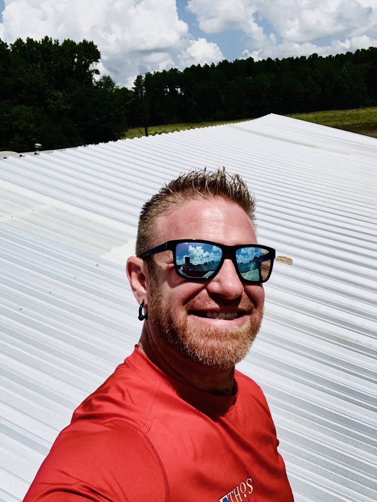 Slide of Ethos Roofing and Contracting