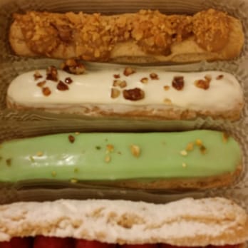 Eclair Bakery - Raspberry, pistachio, maple Pecan and praline éclairs.  Miam ! - Bakeries Near Me - New York, New York
