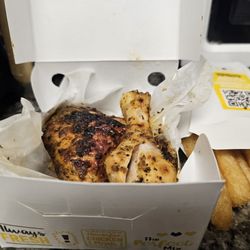 Pollo Campero - Two piece grilled dark meat and yuca fries
