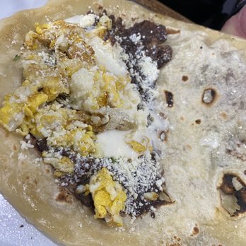 Hot Taco Authentic Mexican Cuisine - a hand holding a taco - Tacos Near Me - Evans City, Pennsylvania Hot Taco Authentic Mexican Cuisine - a hand holding a taco - Tacos Near Me - Evans City, Pennsylvania