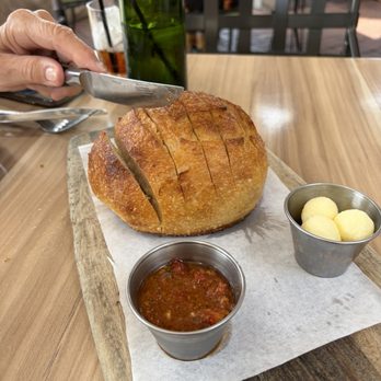 Veranda Restaurant - Hot sourdough that actually tastes as described. Tomato tapenade & real butter - American Near Me - San Diego, California Veranda Restaurant - Hot sourdough that actually tastes as described. Tomato tapenade & real butter - American Near Me - San Diego, California