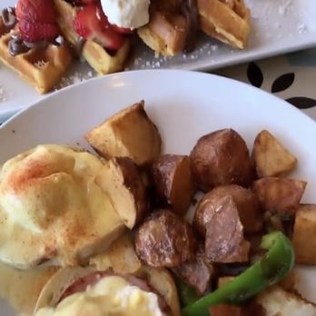 Farmer's Table - top is strawberry nutella waffles and bottom half is classic benedict with potatoes - New American Near Me - La Mesa, California Farmer's Table - top is strawberry nutella waffles and bottom half is classic benedict with potatoes - New American Near Me - La Mesa, California