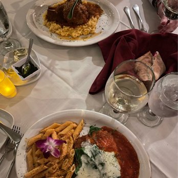 Vino E Pasta - Top: Osso Buco Below: Eggplant Parmesan - Italian Near Me - Tampa, Florida Vino E Pasta - Top: Osso Buco Below: Eggplant Parmesan - Italian Near Me - Tampa, Florida