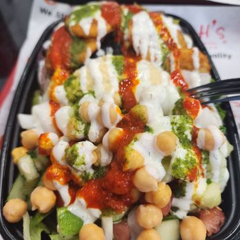 Shah’s Halal Food - Half falafel, half lamb with all my favorite toppings, don't skip the sauces, they are perfection! - Halal Near Me - Vernon, Connecticut Shah’s Halal Food - Half falafel, half lamb with all my favorite toppings, don't skip the sauces, they are perfection! - Halal Near Me - Vernon, Connecticut