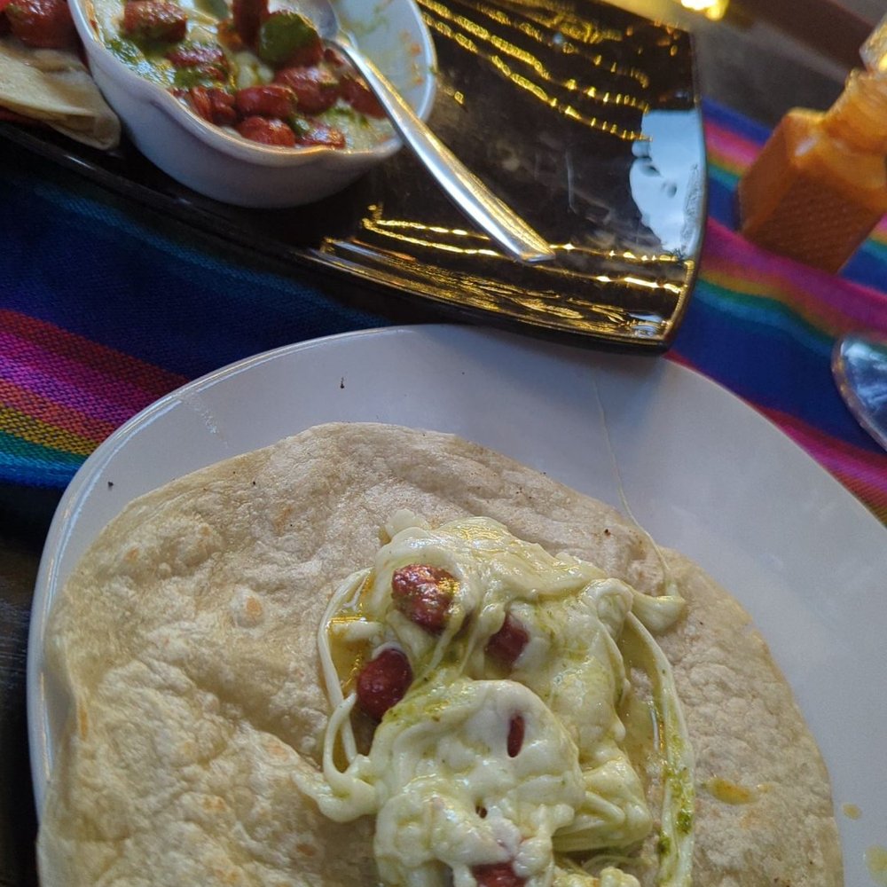 Layla's - Casa fundido with a sausage that is close to chorizo - Mexican Near Me - Puerto Vallarta, JAL Layla's - Casa fundido with a sausage that is close to chorizo - Mexican Near Me - Puerto Vallarta, JAL