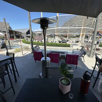 District Wine Village - Patio seating of Workshop Spirits - Wine Tasting Room Near Me - Oliver, British Columbia
