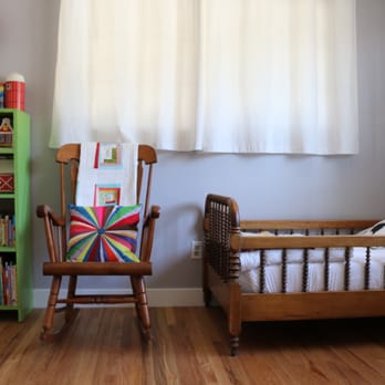 Floors On 4th - a child's room with a rocking chair and bookshelf - Flooring Near Me - Coeur d'Alene, Idaho Floors On 4th - a child's room with a rocking chair and bookshelf - Flooring Near Me - Coeur d'Alene, Idaho
