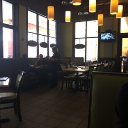 Inside the cool of the a/c... they also have tables outside Inside the cool of the a/c... they also have tables outside