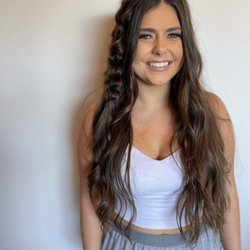 Wedding hair: long dark hair with pull through bubble braid on one side