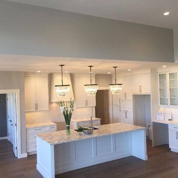 Tilley Electrical Contracting - Modern lighting for your new kitchen. LED dimmable pot lights and under cabinet strip lighting. - Electricians Near Me