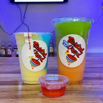 Twisted Liquid Daiquiris To Go - Blue Hawaiian (left) , Uber Me Please (right) , watermelon Jell-O shot (center) - Beer, Wine & Spirits Near Me - Houston, Texas Twisted Liquid Daiquiris To Go - Blue Hawaiian (left) , Uber Me Please (right) , watermelon Jell-O shot (center) - Beer, Wine & Spirits Near Me - Houston, Texas