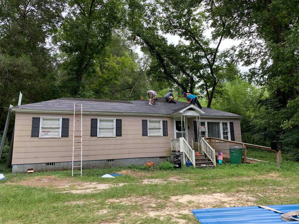 Slide of Brunson's Roofing