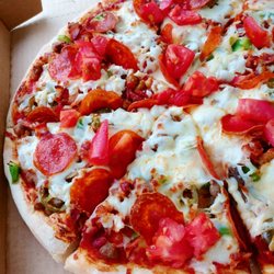 Casey's General Store - You can custom build your pizza online. Go for the works. Tomato chunks are added after it's cooked.