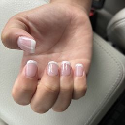 This is a an acrylic tip French nails This is a an acrylic tip French nails