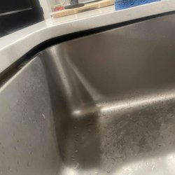 West Texas Granite & Marble - I'm no handyman, but there shouldn't be a gap between the sink and the countertop where water can splash and mold can build up.