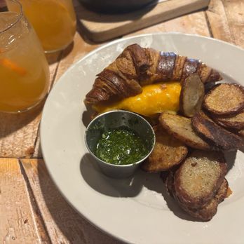 Cafe Kindred - Apple sangria with Breakfast Sandwich and side of potatoes (asked for pesto sauce!) - American Near Me - Falls Church, Virginia Cafe Kindred - Apple sangria with Breakfast Sandwich and side of potatoes (asked for pesto sauce!) - American Near Me - Falls Church, Virginia