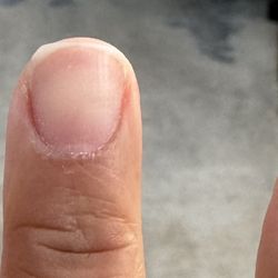 VIP Nails & Spa - Manicure w/o polish. Asked for round but got uneven nails instead