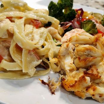 Fat Boys Crab House - Shrimp fettuccine pasta alfredo, broiled 8oz crab cake, seasonal vegetables - Seafood Near Me - Crofton, Maryland