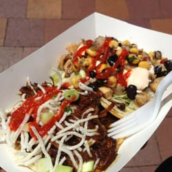 Raymond's Catering - Indonesian pulled pork taco on the bottom and south west grilled chicken taco on top.
