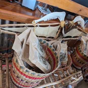 Delish Espresso Bar - a variety of bags on a chair - Coffee & Tea Near Me - Lincoln City, Oregon Delish Espresso Bar - a variety of bags on a chair - Coffee & Tea Near Me - Lincoln City, Oregon