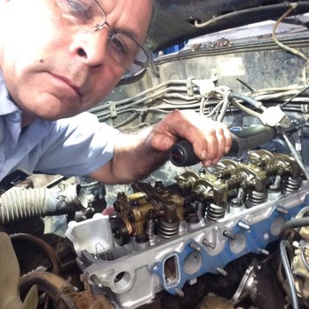 Lopez Automotive - Torquing a cylinder head on a Mitsubishi pickup, it had a burn exhaust valves, as a result of a leak down test.... - Auto Repair Near Me - Ukiah, California