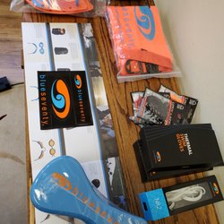 TCMTriSquad - Swimming accessories such as goggles, pull buoys, paddles and wetsuit hoodies and booties.
