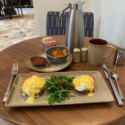 Eggs benedict and home fries Eggs benedict and home fries