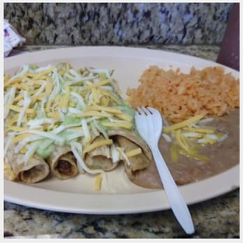 Toro Taco - a plate of food with rice and beans - Mexican Near Me - Selah, Washington