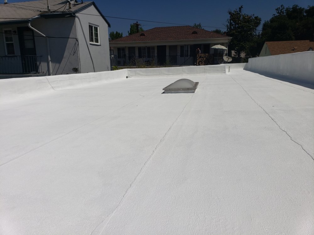 Slide of 2Gun Roofing & Waterproofing