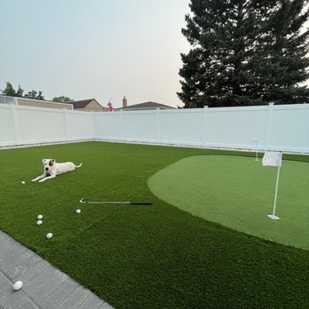Maj Lawncare - Turf backyard with putting green - Snow Removal Near Me