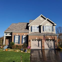Merit Roofing and Exteriors - Roof Replacement