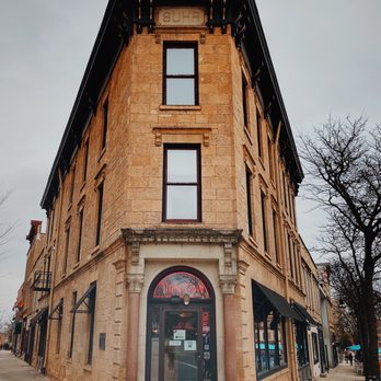 The Tipsy Cow - a building on a street corner - Bars Near Me - Madison, Wisconsin