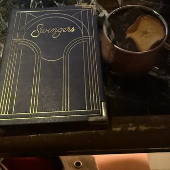 Swingers - The gorgeous menu and most delicious Caramel Apple Crown Royale Drink - Bars Near Me - Las Vegas, Nevada Swingers - The gorgeous menu and most delicious Caramel Apple Crown Royale Drink - Bars Near Me - Las Vegas, Nevada